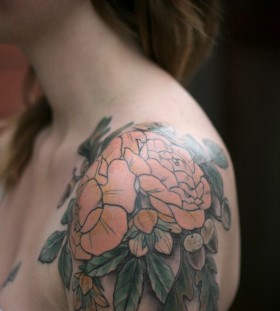 Lovely flowers shoulder tattoo by Kirsten Holliday