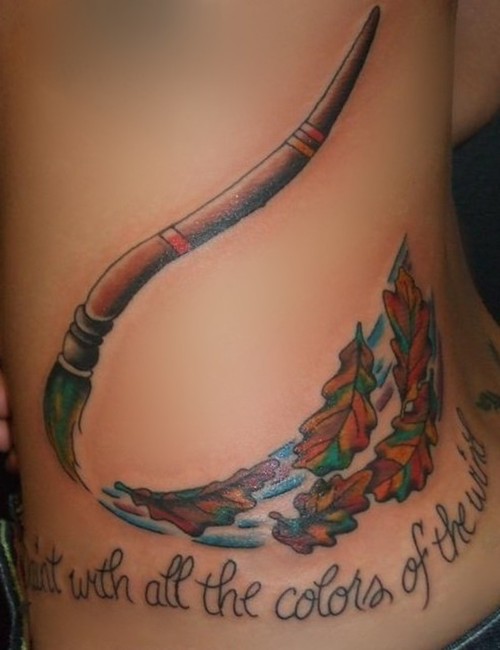 Lovely paint brush and quote tattoo