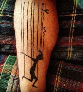 Lovely puppet leg tattoo