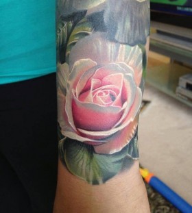 Lovely rose tattoo by Phil Garcia