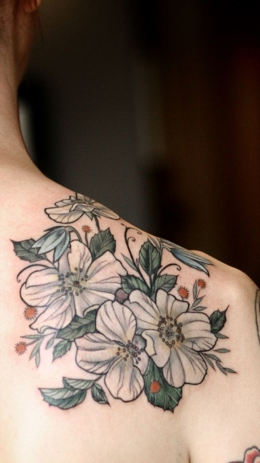 Lovely white flowers tattoo by Alice Kendall