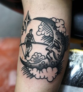 Man and moon tattoo by Philip Yarnell