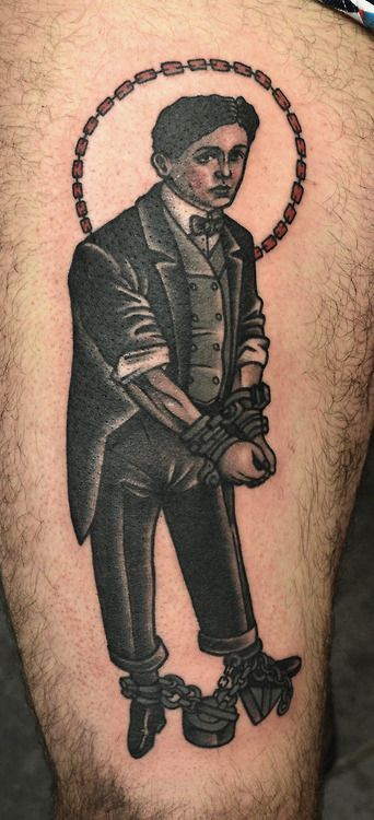 Man tied with chains tattoo by Philip Yarnell