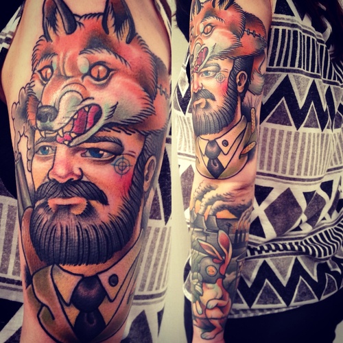 Man with fox head tattoo by Alex Dorfler