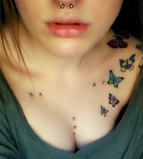 Many colourful butterflies tattoo