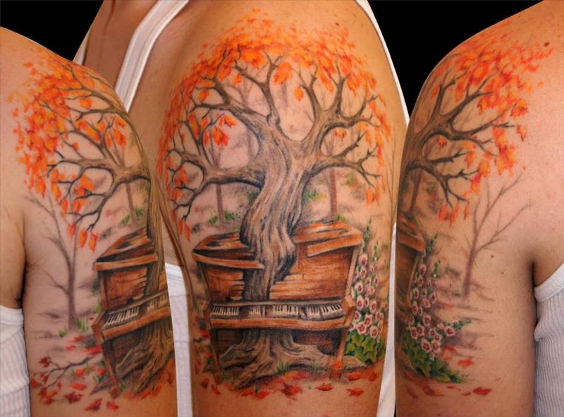 Maple tree arm tattoo