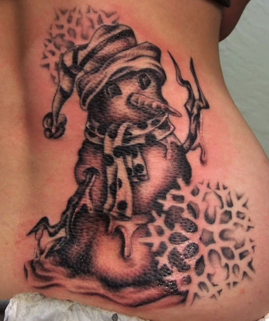 Melting snowman back tattoo