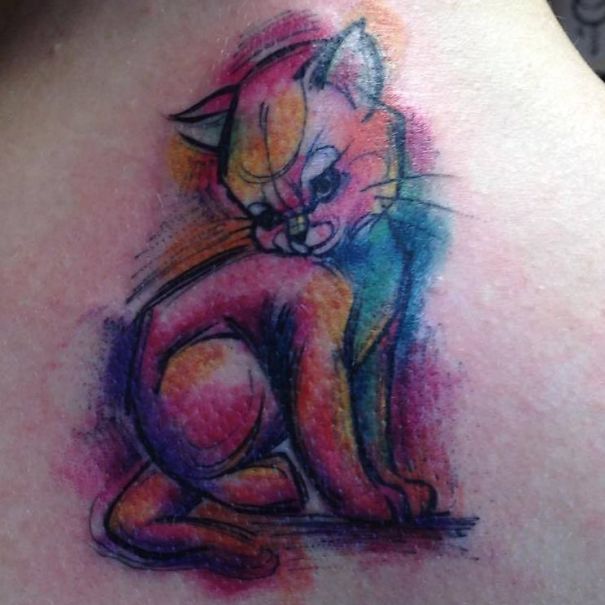 Minimalistic watercolor cat tattoo
