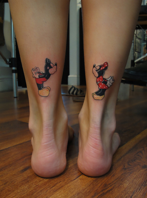 Minnie and Mickey leg tattoos