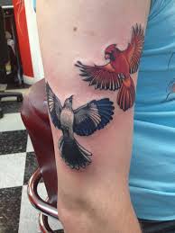 Mockingbird and cardinal tattoo
