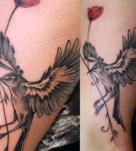 Mockingbird and flower tattoo