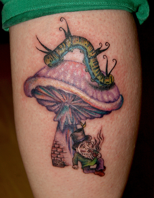 Mushroom and caterpillar tattoo