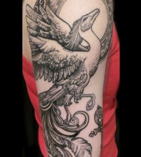 Mythical bird arm tattoo by Ellen Westholm