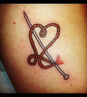 Needle and rope tattoo