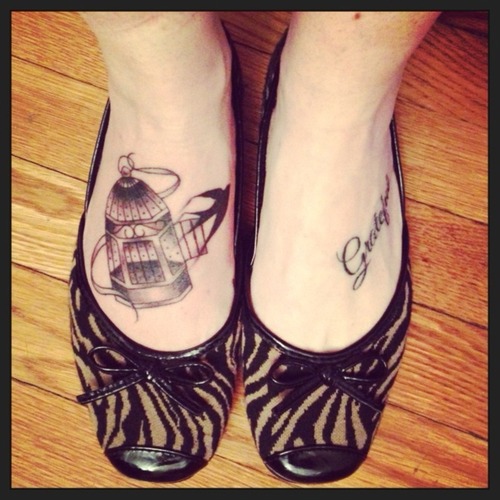 Nice birdcage foot tattoo
