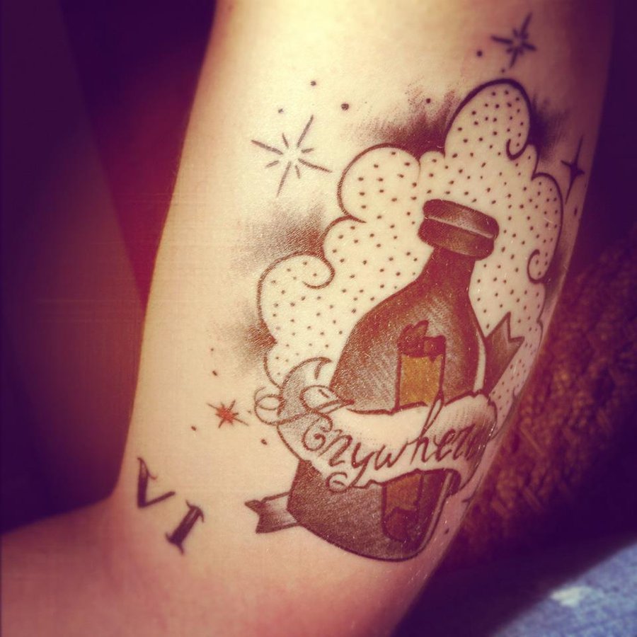 Nice bottle arm tattoo