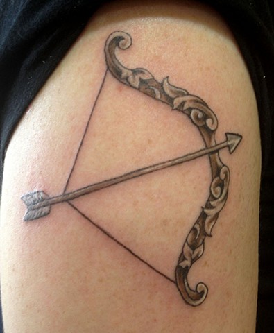 Nice bow and arrow tattoo