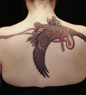 Nice crane back tattoo