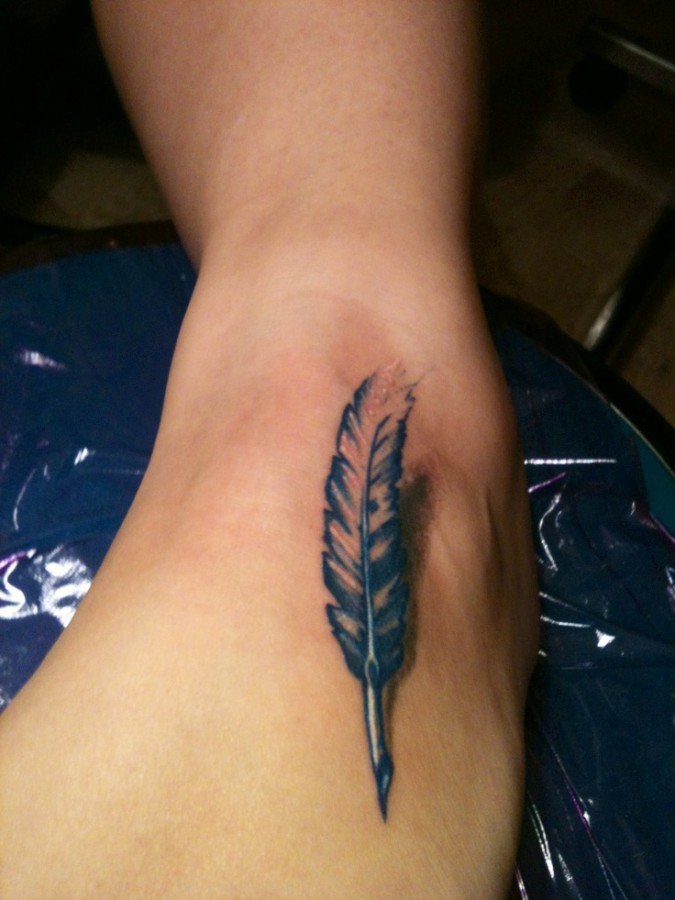 Nice feather pen tattoo