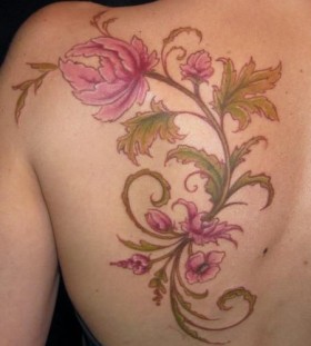 Nice flower back tattoo by Jessica Brennan