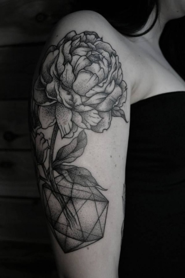 Nice flower tattoo by Thomas Cardiff