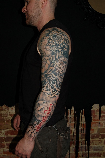 Nice full arm tattoo by David Allen