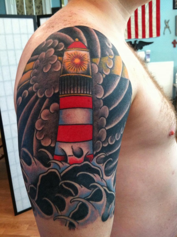 Nice lighthouse arm tattoo
