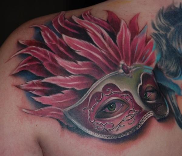 Nice mask tattoo by Kyle Cotterman