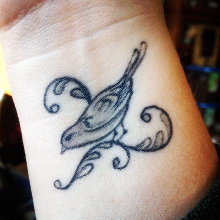 Nice mockingbird wrist tattoo
