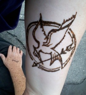 Nice mockingjay arm tattoo