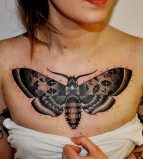 Nice moth chest tattoo