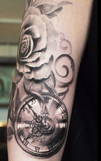 Nice old clock arm tattoo by Ellen Westholm
