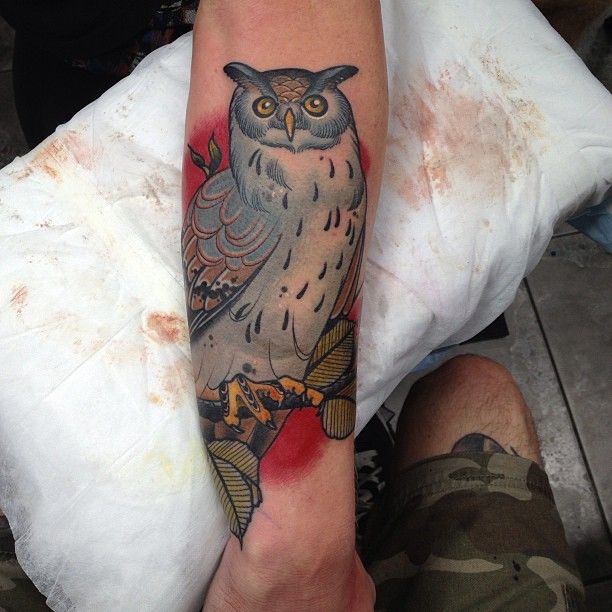 Nice owl tattoo by Dan Molloy