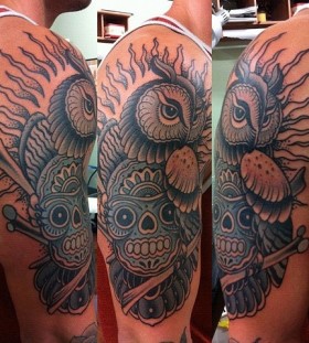 Nice owl tattoo by W. T. Norbert
