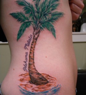 Nice palm tree side tattoo