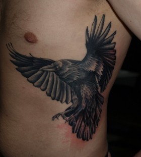 Nice raven side tattoo