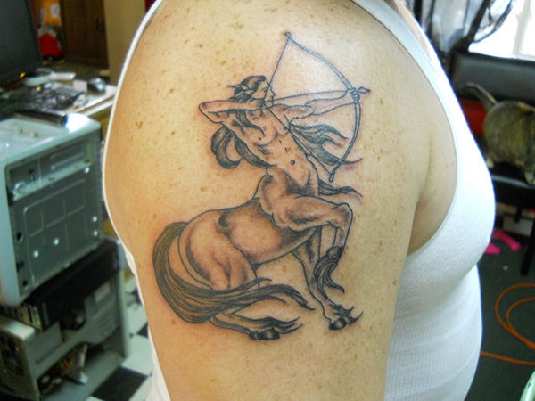 Nice sagittarius arm tattoo