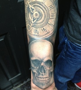 Nice skull and clock tattoo