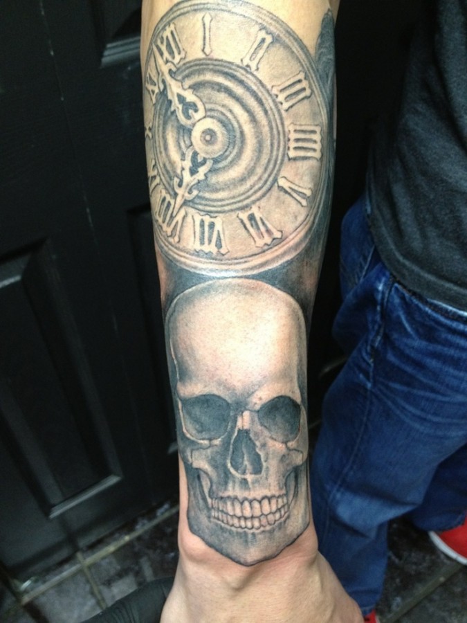 Nice skull and clock tattoo
