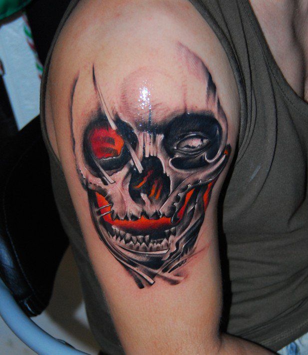 Nice skull tattoo by Razvan Popescu