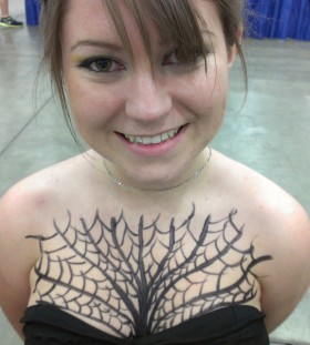 Nice spider web chest tattoo