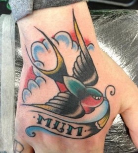 Nice swallow hand tattoo
