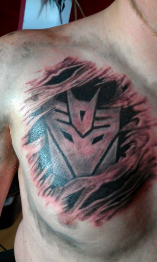 Nice transformers logo tattoo