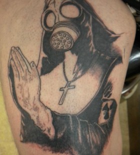 Nun with gas mask tattoo
