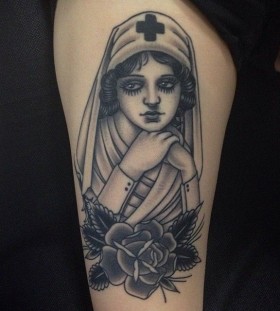 Nurse and flowers tattoo