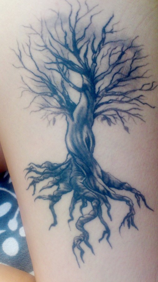 Oak tree tattoo on leg