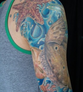 Ocean and starfish tattoo