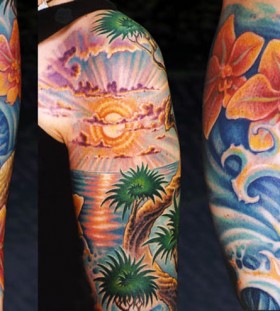 Ocean and sun tattoo
