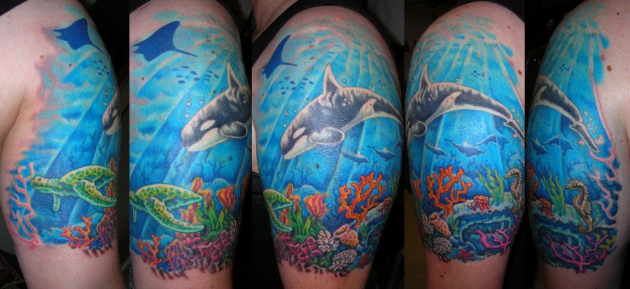 Ocean and whale tattoo