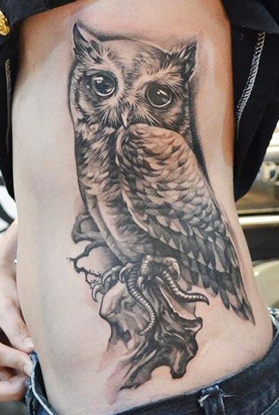 Owl side tattoo by Elvin Yong